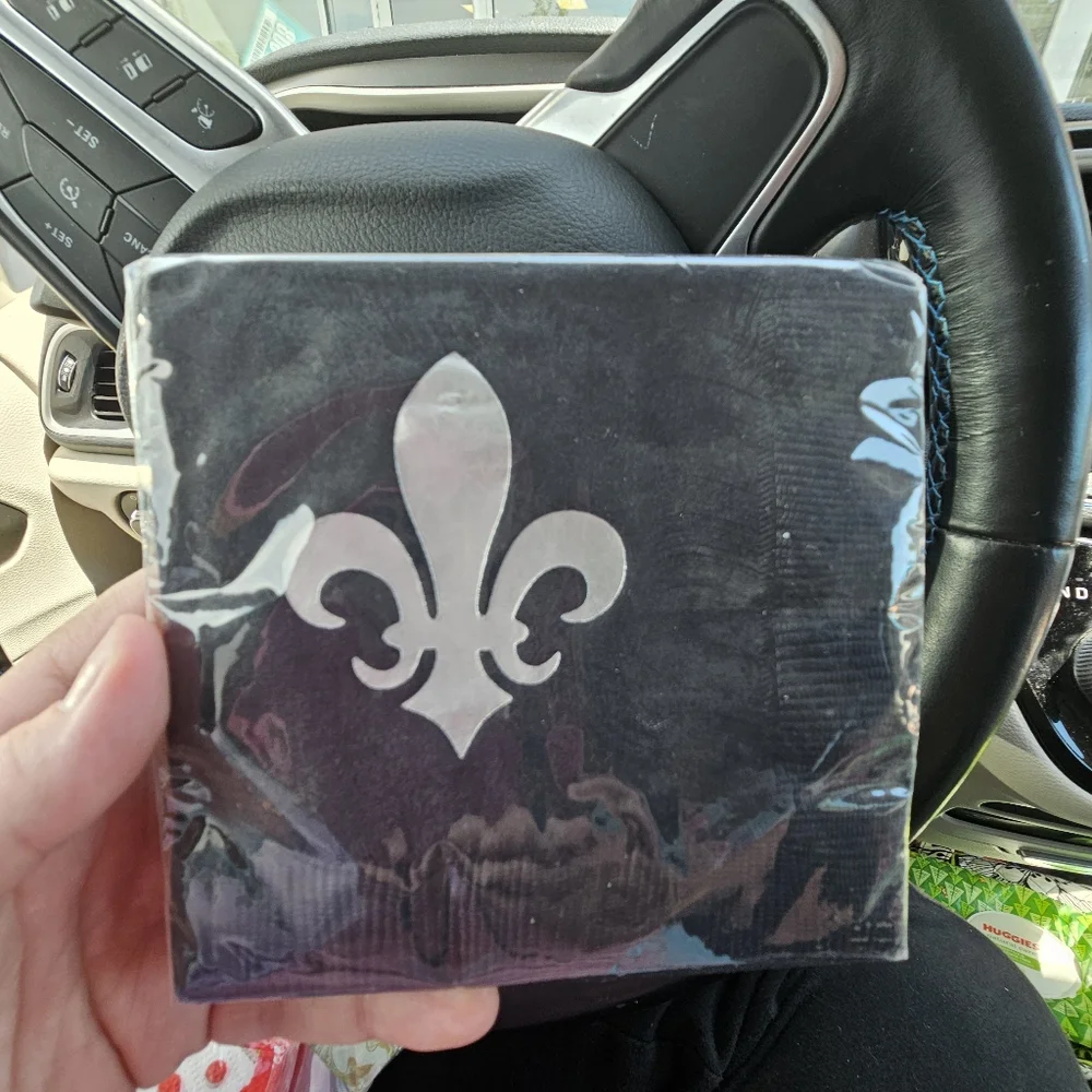 15 packs of various size napkins and themes